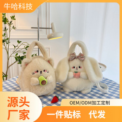 新商品の牛油果のぬいぐるみのぬいぐるみの包みは猫の人形の少女の心の斜めに包みます。
