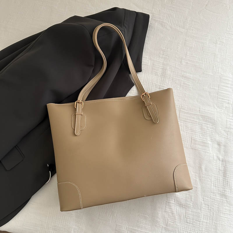 Alta sensación de gran capacidad bolso de mano 2024 otoño y invierno nuevo estilo versátil bolso de hombro de viaje al trabajo bolso especial