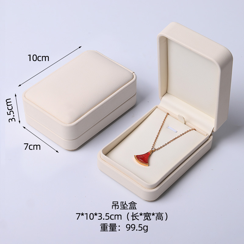 Caja de joyería rosa de alta calidad de cuero pu caja de embalaje de marca de joyería logotipo colgante pulsera collar caja de anillo