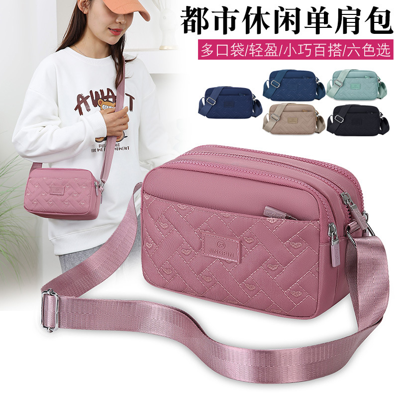 女布包斜挎包新款簡約休閒背包尼龍單肩斜跨包時尚防水媽媽包