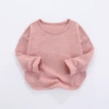 Pale pinkish gray
