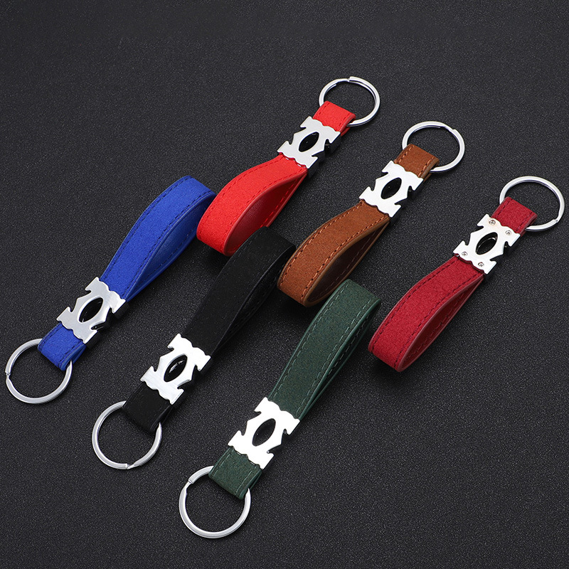 Nuevo llavero de coche de moda llavero de piel de gamula pareja de hombres y mujeres colgante creativo de personalidad de alta gama