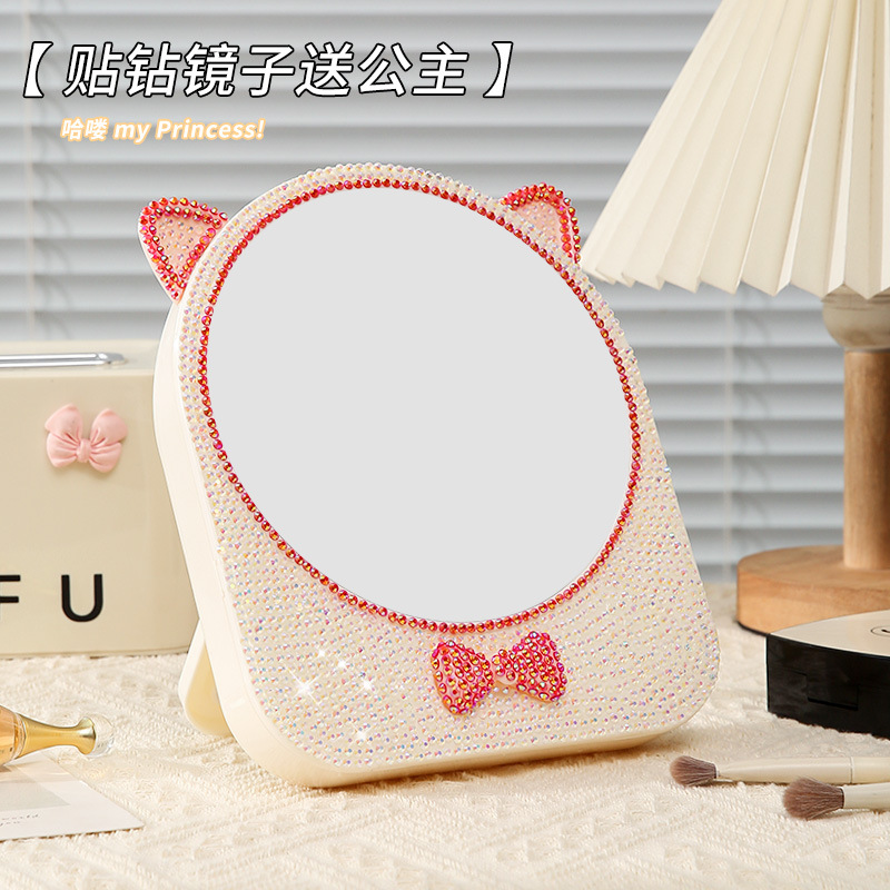 Espejo de maquillaje de escritorio de plástico ins espejo de maquillaje de niña almacén de arco espejo plegable lindo gato oídos espejo