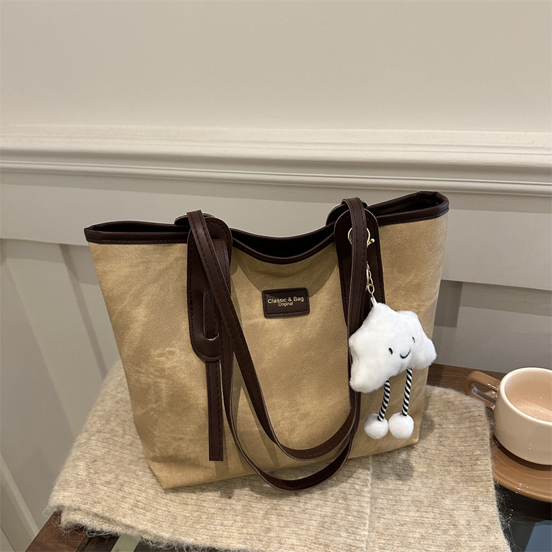 Bolso retro de gran capacidad para mujeres 2024 nueva moda textura bolso de hombro simple empalme bolso de viaje