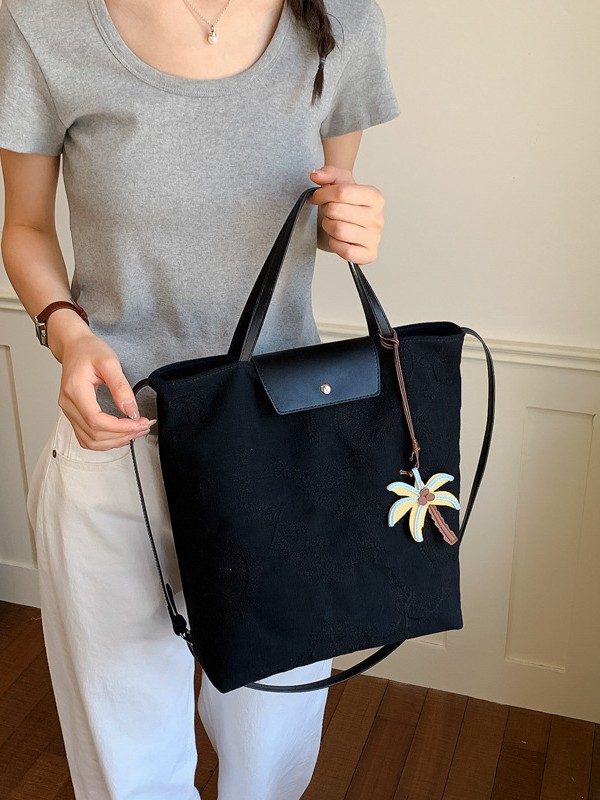 Bolso de mujer 2026 nuevo estilo coreano tela de gran capacidad bolso de mano de viaje simple diario mochila de hombro