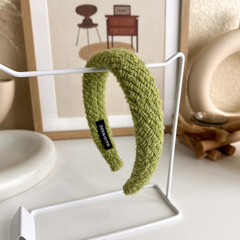 韓国の秋冬の編み物の高い頭の頂の広い辺のカチューシャの女性の外出の百合の髪の気質の毛のカチューシャの頭の飾り