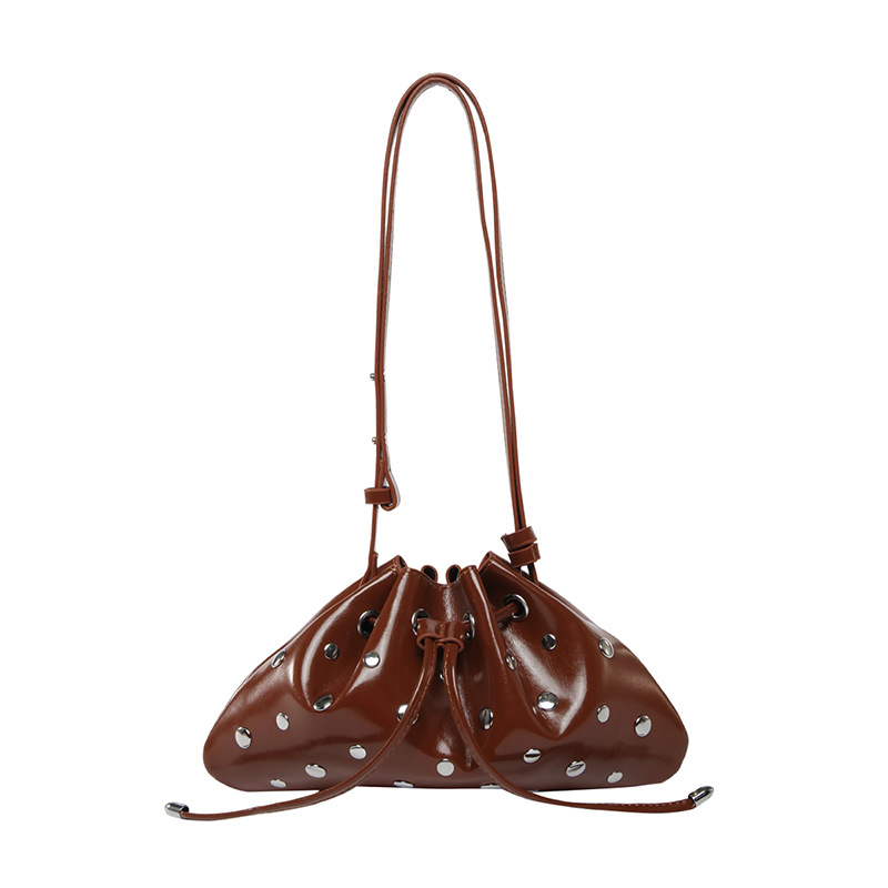 Bolso de cubo de textura transfronteriza 2025 verano nuevo bolso femenino moda gypsophila bolso de hombro remache personalizado bolso de mensajero