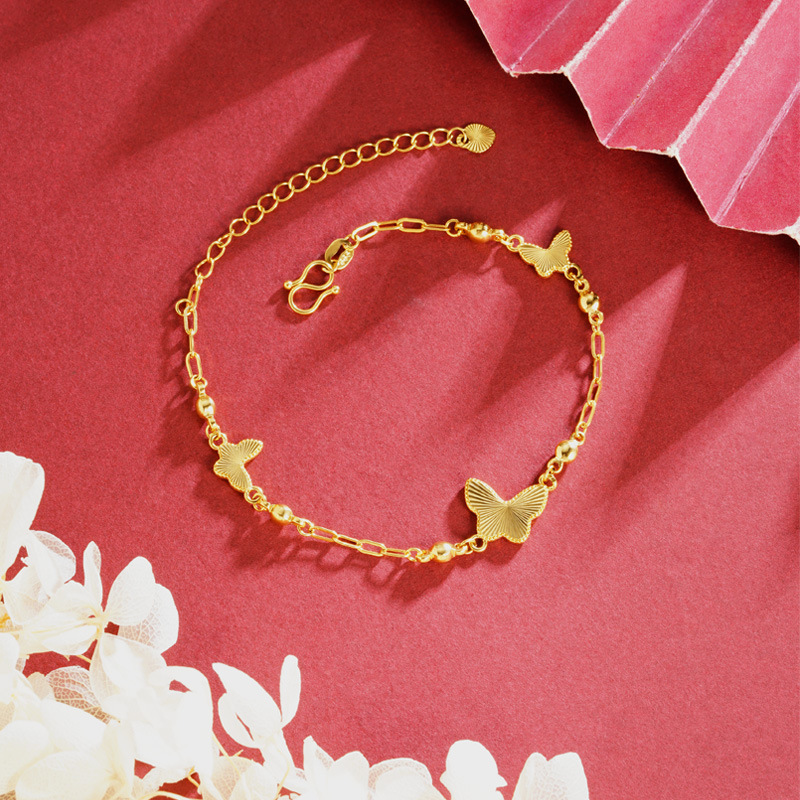 Tobillera de oro de arena de Vietnam, flash, mariposa láser, accesorios femeninos con cuentas, joyería de diseño de nicho de lujo ligero, Yiwu al por mayor