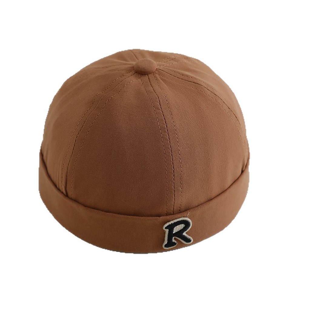 Primavera niños terratenientes sombreros hombres y mujeres letras de la marea sin bordes sombreros de piel de melón sombreros de calabaza sombreros de boina de personalidad