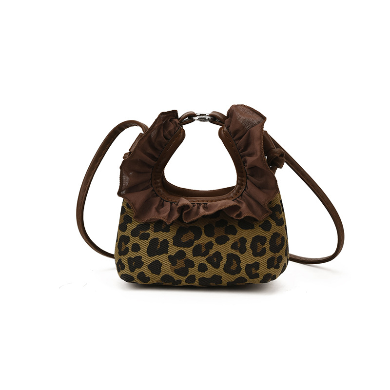 Moda coreana con patrón de leopardo para niñas bolsos de encaje exquisitos mini bolsos de hombro para bebés bolsos de comercio exterior transfronterizos para niños