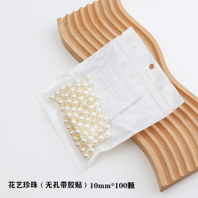 Material de embalaje de flores al por mayor nuevo estilo Chanel de una sola pieza que forma pieza redonda ramo bolsa de tela flor artefacto