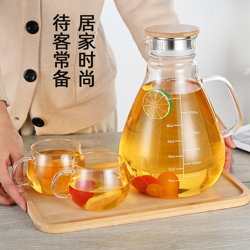 Botella de agua fría de vidrio resistente al calor del fabricante cubierta de acero inoxidable olla de jugo de gran capacidad botella de agua fría de vidrio transparente