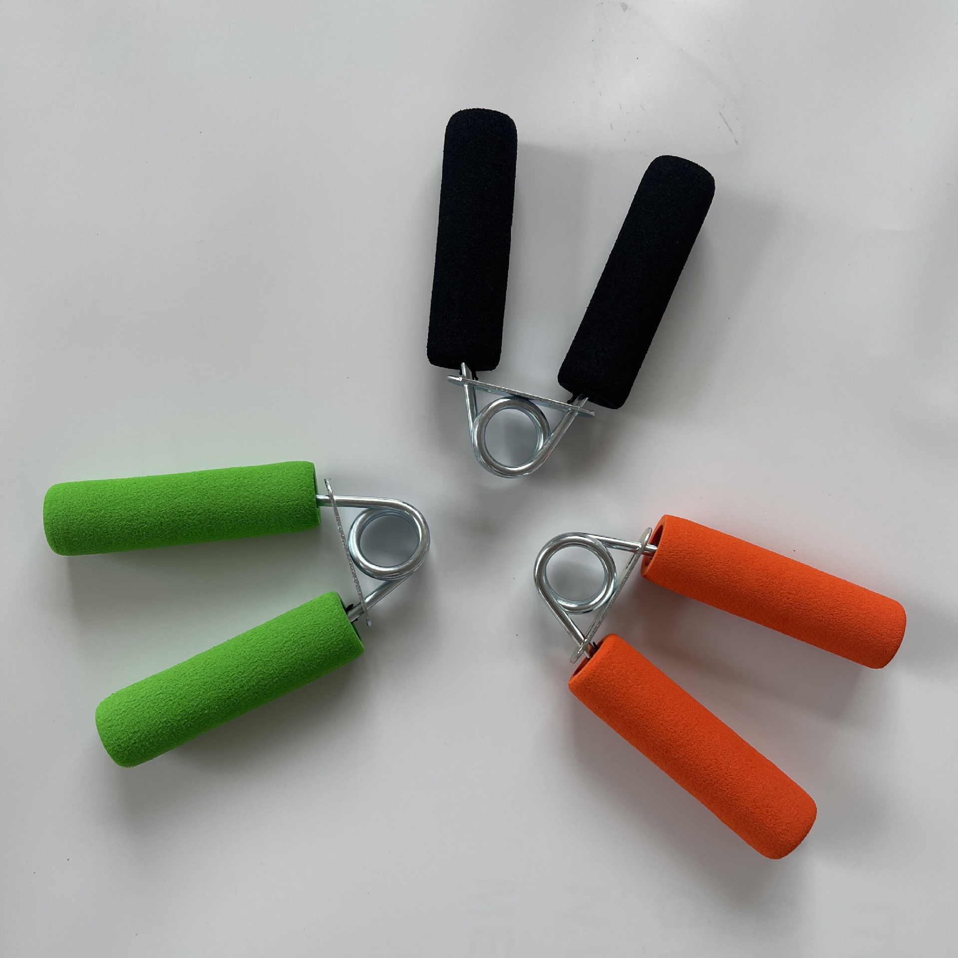 Foam A-type spring sponge hand gripper, home fitness equipment, for building arm and hand strength, durable double foam shell.