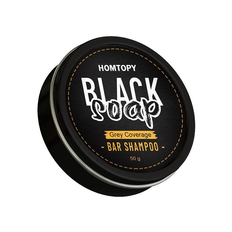 Homtopy men’s grey coverage bar shampoo for dark hair 50g in a sleek black tin with gold stitching accents and white lettering.