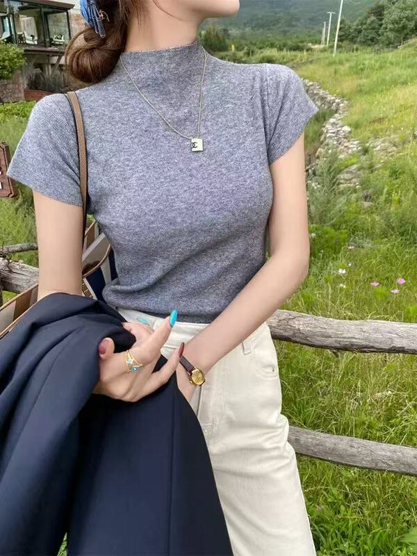 柔らかいモチモチの半高襟のニットの半袖のtシャツの女性の春秋の新型の中は気質が現れます。|undefined