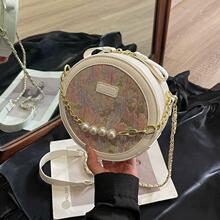 2024新款百搭秋冬小圆饼斜挎包洋气小众时尚珍珠包包女简约小圆包