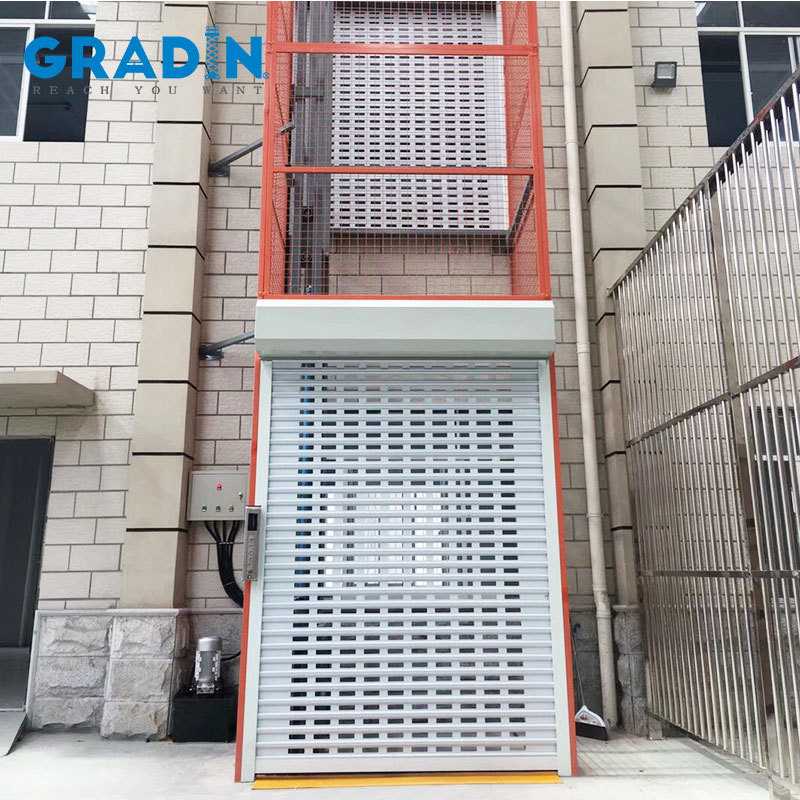 现货室外2-3层卷帘门导轨式液压货梯 液压升降机平台厂家厂房货梯