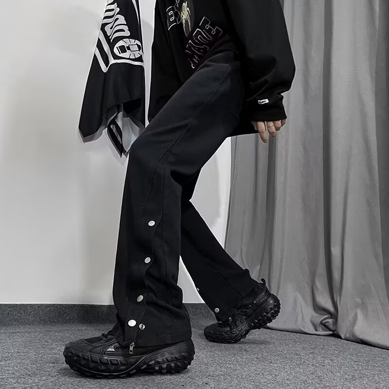 Otoño y invierno nuevo estilo americano botón negro jeans de moda micro bocina casual nicho pantalones hip-hop