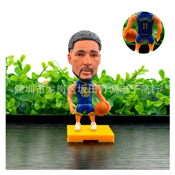 No. 11-Thompson (blue clothes)