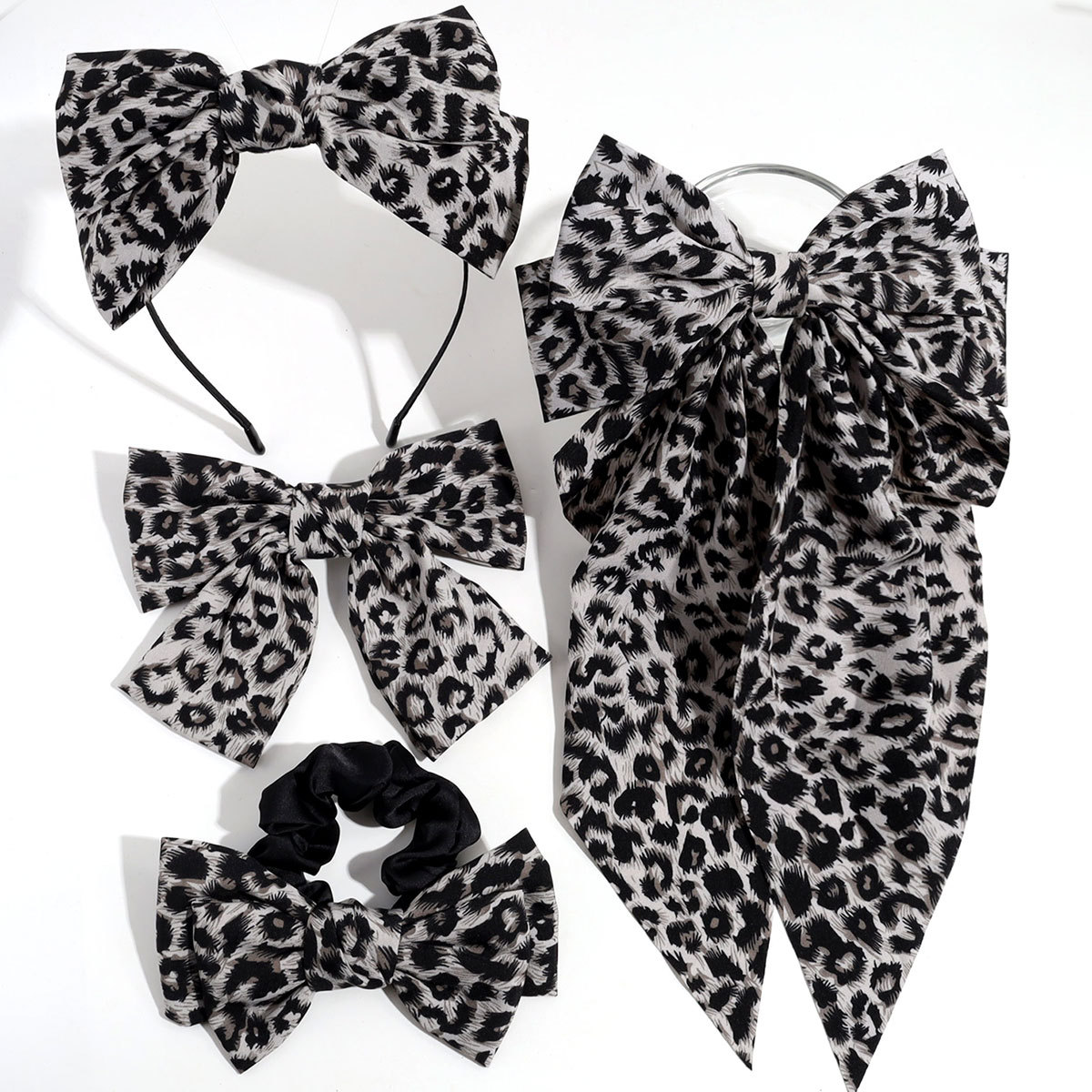 Estilo de moda europeo y americano personalidad nicho de diseño arco leopardo aro de pelo clip de resorte retrógrado anillo para el pelo accesorios para el pelo