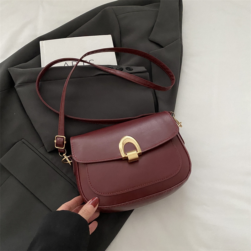 A principios de la primavera de 2025, bolsos de silla de moda casuales coreanos, bolsos de mujer de alta calidad.