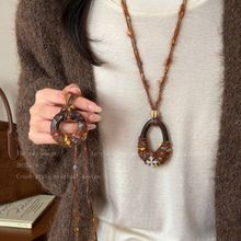 咖色不规则毛线项链女2025新款可调节秋冬毛衣链小众独特吊坠配饰
