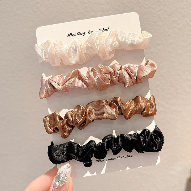 Cuerdas de cabeza de alta elasticidad duradera niñas delicadas anillo de cabello de alta calidad cuerdas de cabello de cola de caballo atadas de cabello correa cubierta de cuero
