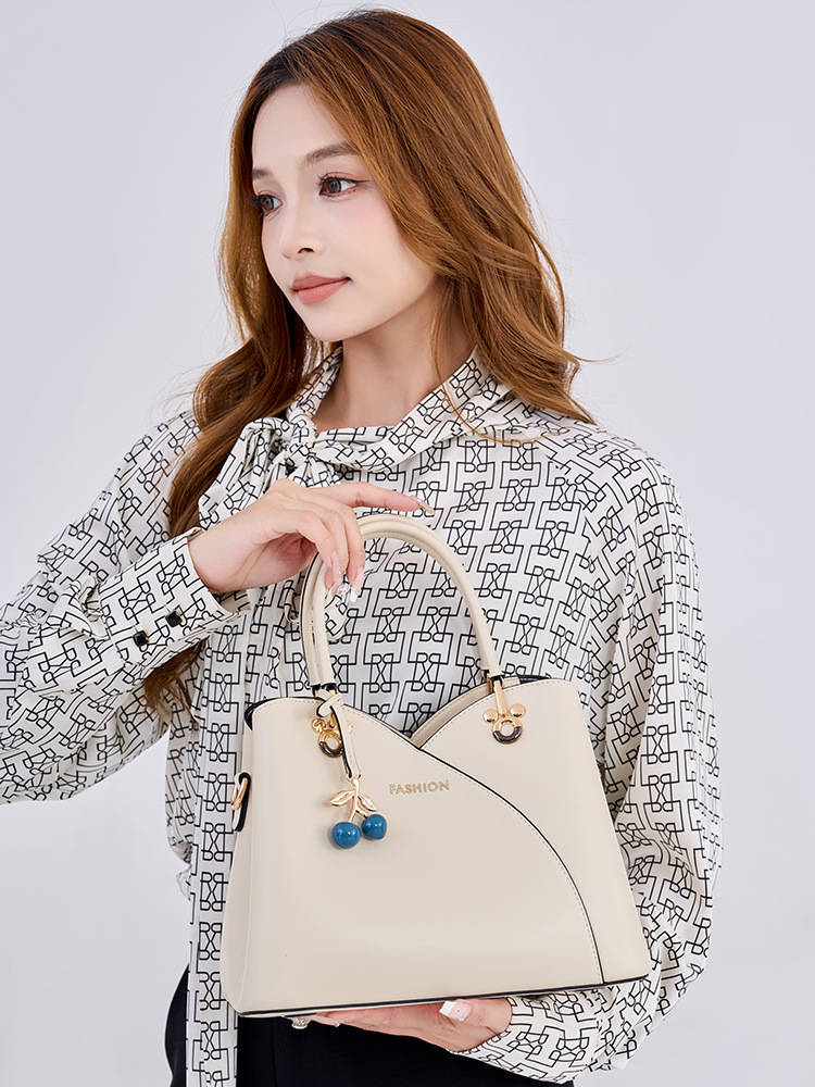 Bolso de cuero para mujeres, bolso de viaje de cuatro estaciones, bolso de moda de madres de mediana edad, bolso de alta calidad, bolso de mujer.