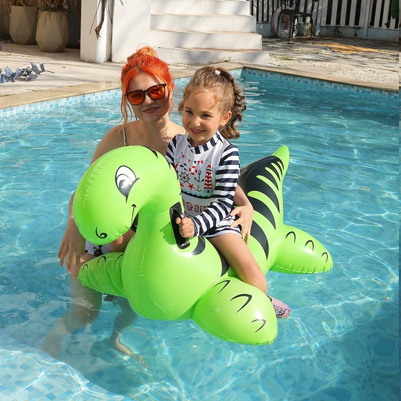 Big inflatable dinosaur play in water for early age