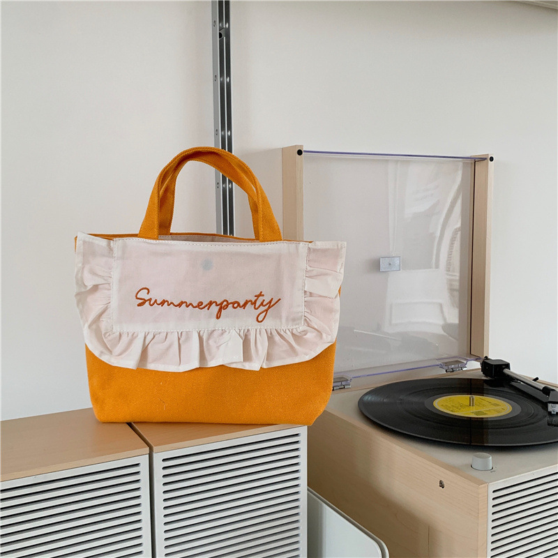 1441 Japanese and Korean chic Sweet ruffled bento Bag, Fresh embroidered hand-held small cloth bag, girl student bag wholesale undefined