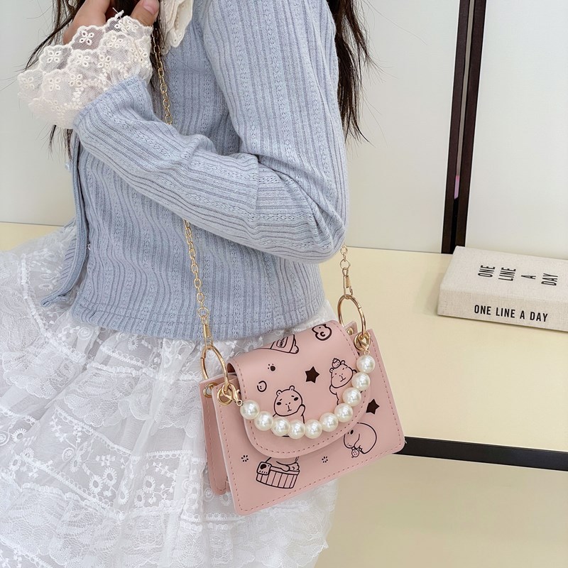 Versión coreana del bolso de hombro para niños Xiaoxiangfeng, lindo y divertido Kapibala, bolso de perlas para niños, nuevo bolso de cadena para niños