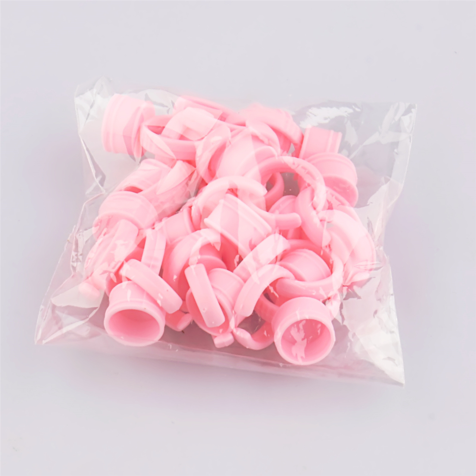 Tazas para tinta de tatuaje, bandejas para pegamento de pestañas postizas, tazas de tinta en forma de anillo, tamaños grande, mediano y pequeño, 100 piezas, modelos nuevos.