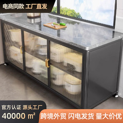 台所の物置棚の岩板が床に落ちて多層機能が壁に寄りかかって一体になって棚の食事を収納しながらのテーブルの物置棚の戸棚