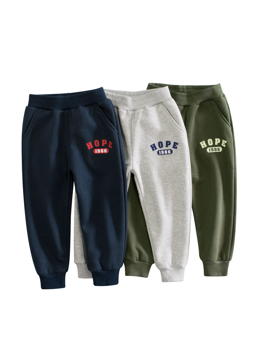 27 niños estilo coreano ropa para niños pantalones largos para niños transfronterizos letras deportes para niños Pantalones deportivos con cordones de lana entrega de una sola pieza