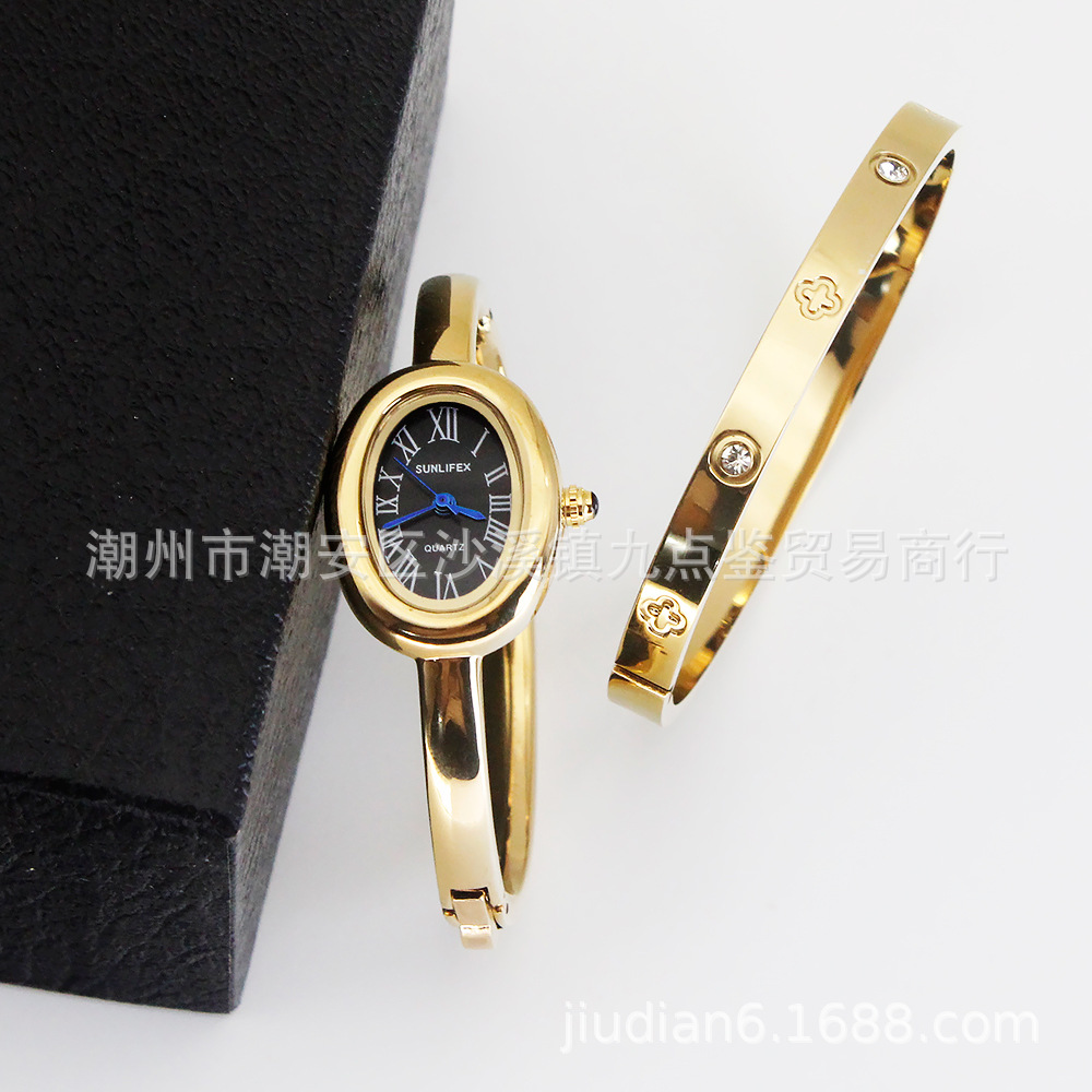 Gold strap black dial watch + bracelet