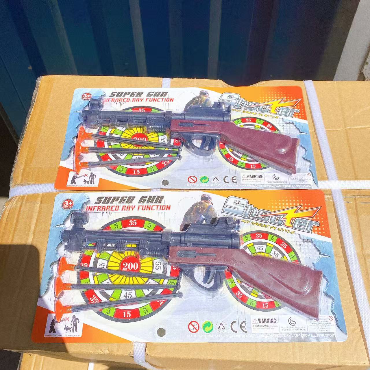 Nuevos juegos de juguetes para niños para jugar con pistolas de succión de plástico 2 juguetes de plástico de dibujos animados coloridos al por mayor