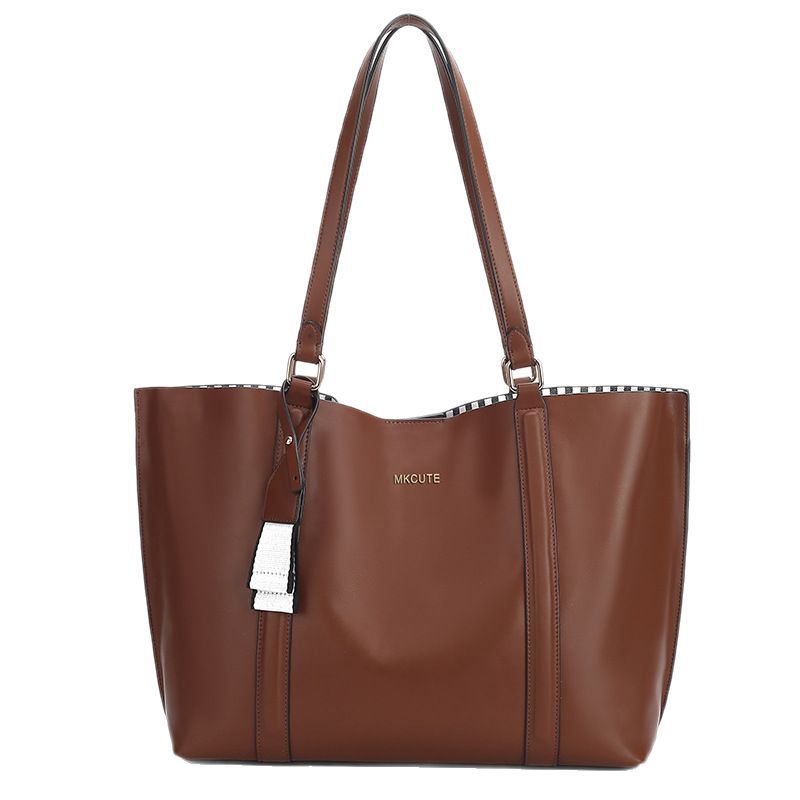 Bolsos tote populares para mujer, ideales para otoño e invierno. Bolsos de gran capacidad con diseños simples y elegantes. Bolsos tote retro.