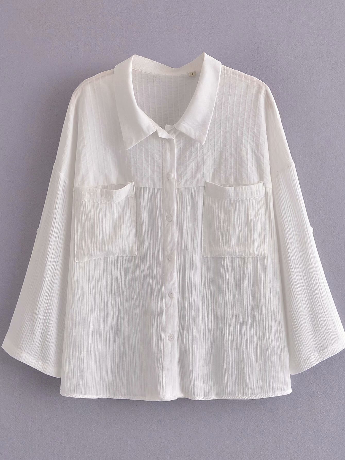 camisa blanca con solapa de doble bolsillo NSAM47491