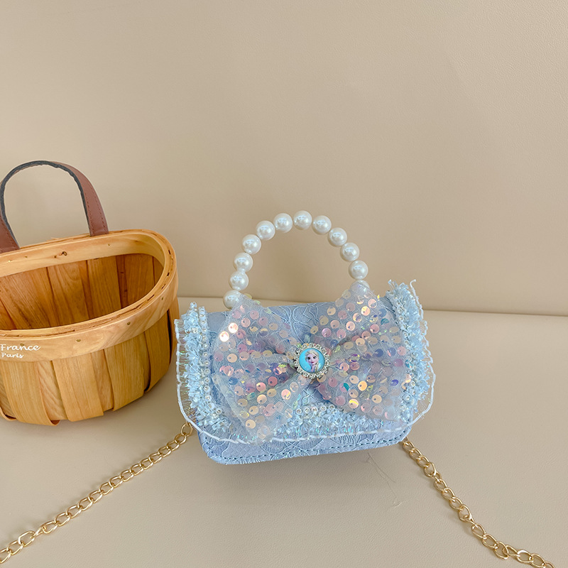 Primavera y verano nueva celebridad en línea bolso de los niños moda Chanel estilo princesa bolsa pequeña niña linda bolsa de mensajero portátil al por mayor