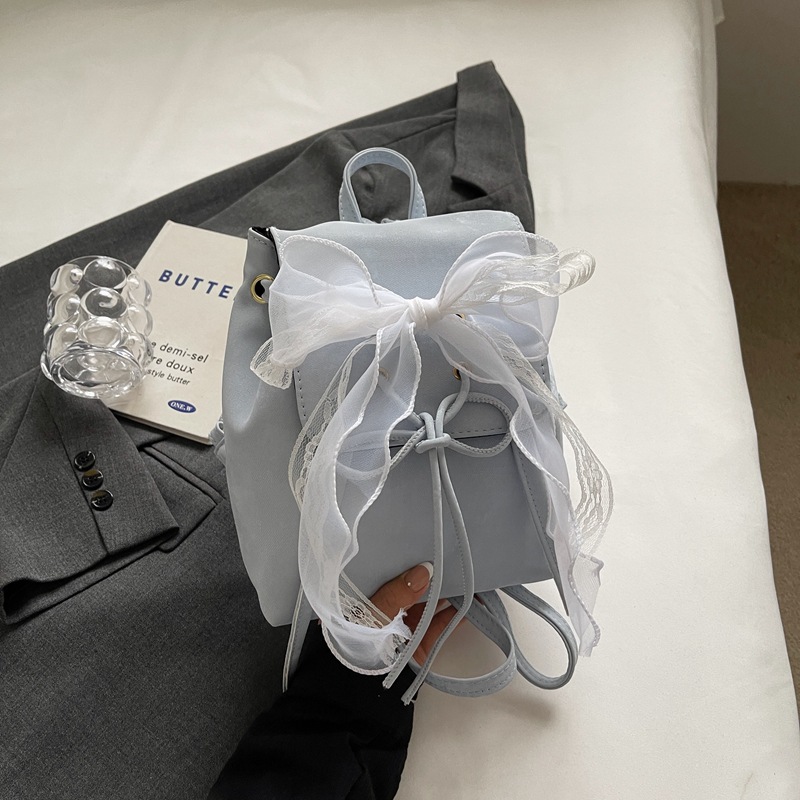 Gran capacidad coreana encantadora mochila de moda de ballet para mujeres 2024 nuevo bolso de cubo de arco de verano