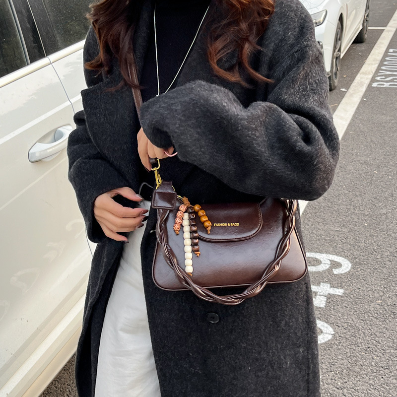 Bolsas de mujer transfronterizas retro de cuero suave de hombro brazo bolsas de invierno 2025 nuevo estilo de alta calidad de la mochila de viaje al trabajo