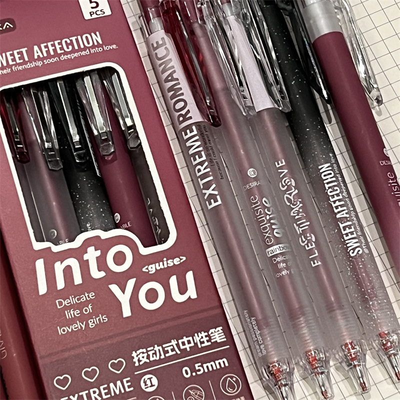 Bolígrafo rojo para cambiar el mal viento bolígrafo rojo simple bolígrafo rojo de alto valor de los estudiantes maestros bolígrafo rojo corazón de la niña