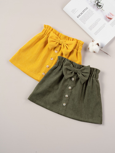2024 Trendy Spring Girls' Semi-Body Skirt in Corduroy Solid Color with Bow Blouse Button, Stylish Baby Girls' Short Skirt