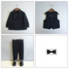 Black suit, vest, trousers, beige bow tie lapel pin