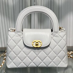 Chanel-style 23K Autumn/Winter New Arrival Kelly Bag: Premium Leather Women's Handbag with Shoulder and Crossbody Straps, Featuring a Diamond Quilted Design and Chain Detail