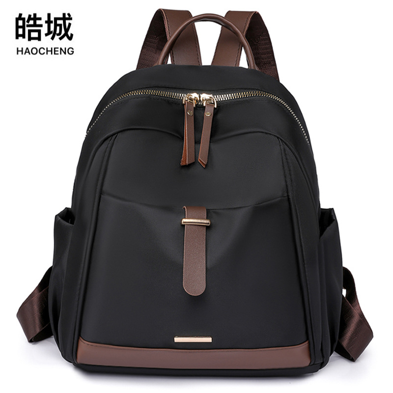 Bolsos para mujer 2023 nueva mochila casual para mujer de nailon moda salvaje al aire libre viaje pequeño mochila marea