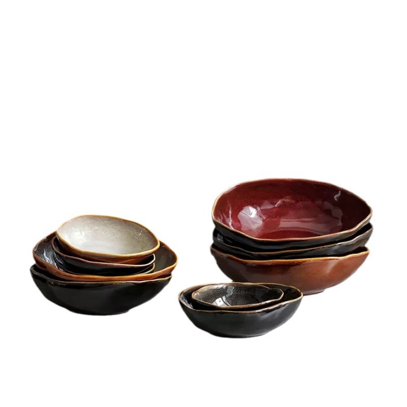 Platos caseros de cerámica creativos transfronterizos irregulares Platos de fiador de carne Platos occidentales de estilo europeo de alto valor bajo vidriado Platos de desayuno