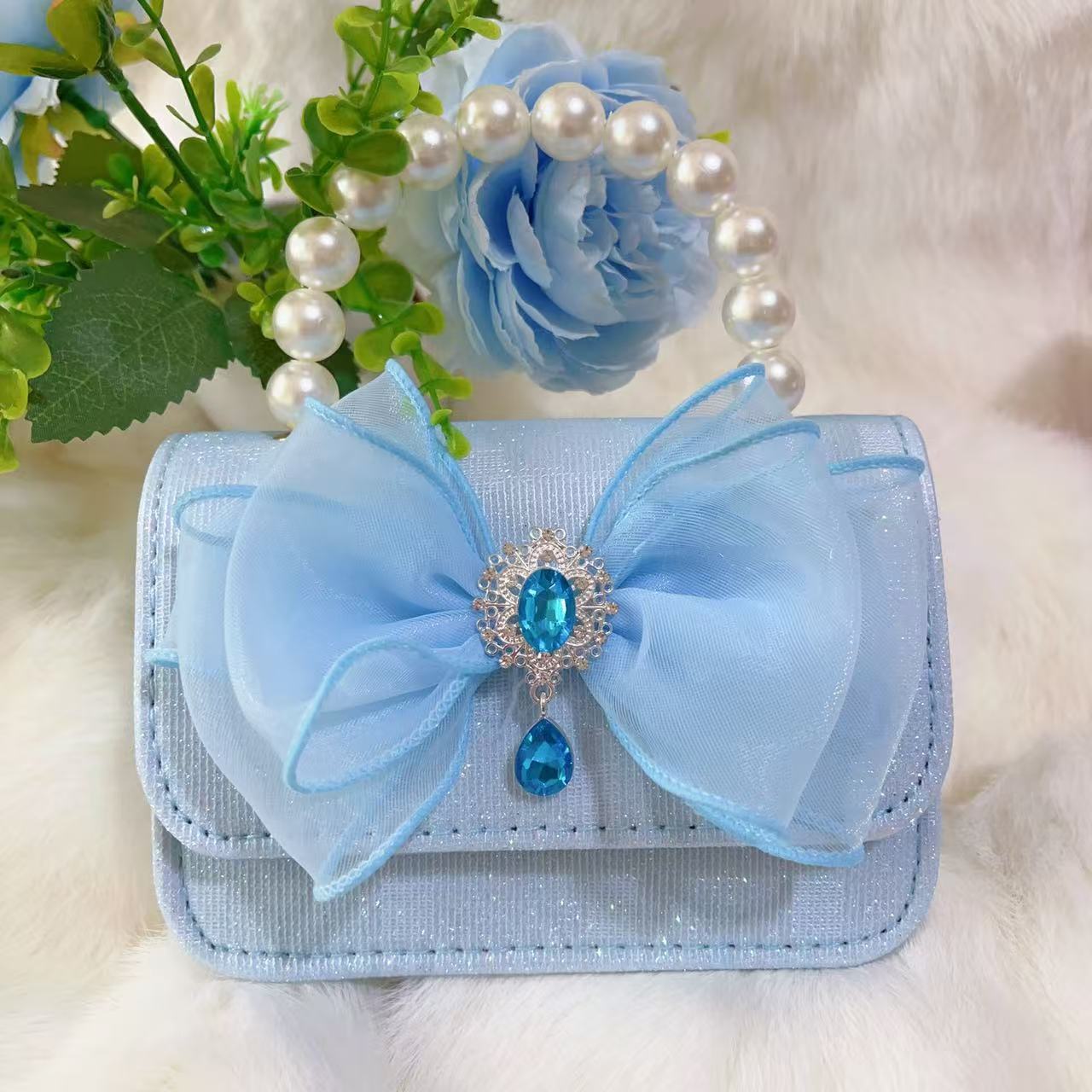 Bagos de perlas para niños 2025 nuevos bolsos de niños bolsos de mochila de niñas bolsos accesorios de princesa bolsos de viento de fragancia