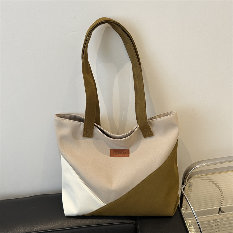 Bolsa de tela de gran capacidad para mujeres 2024 nuevo bolso de alta calidad nicho bolso de viaje bolso de hombro de moda