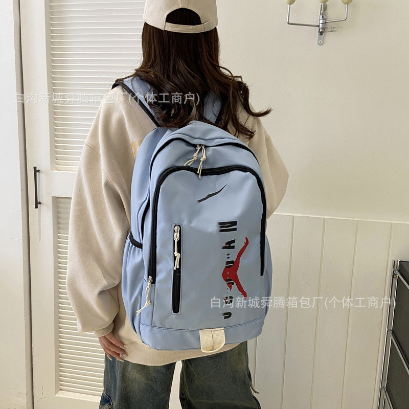 경량 배낭 여성 트렌디 브랜드 문자 로고 캐주얼 여행 배낭 척추 보호대 중학생 학교 가방 도매